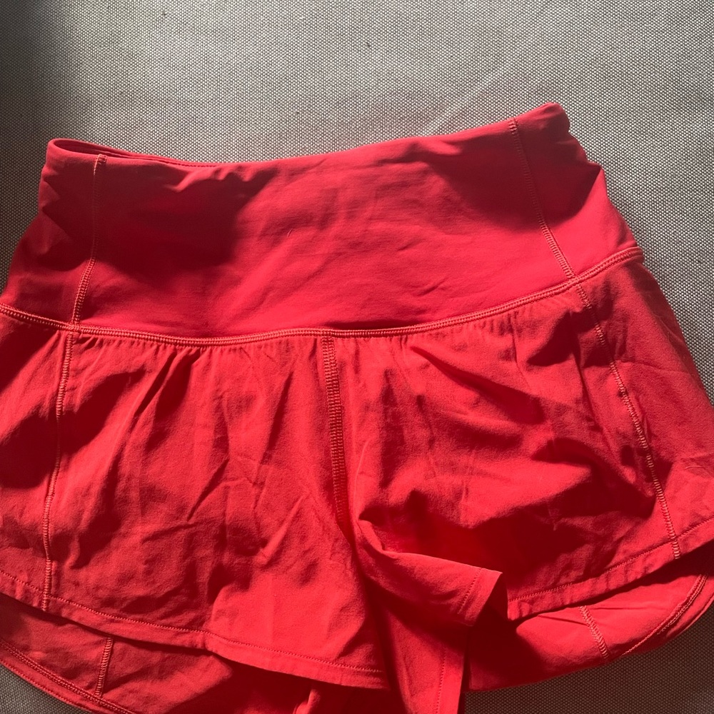 Lululemon speed up shorts in red, size 0